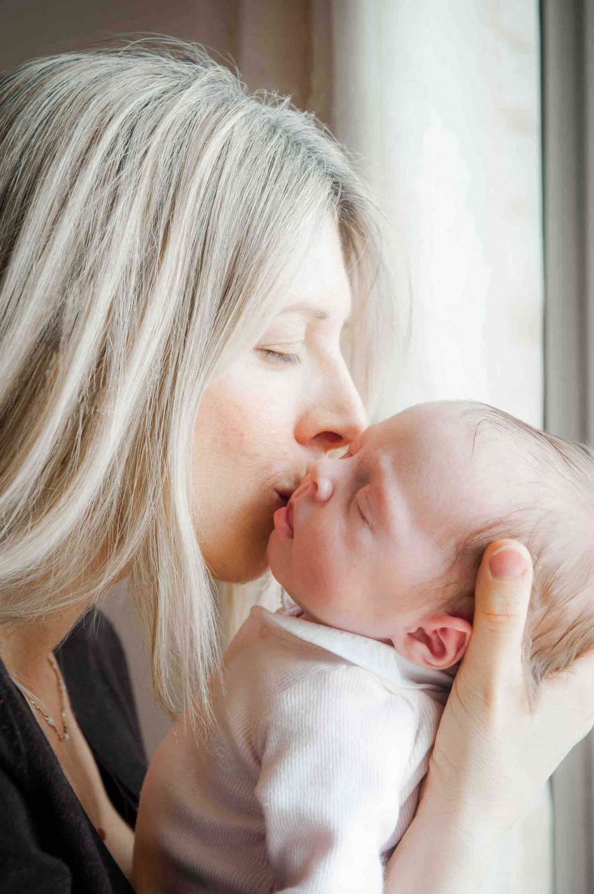 Newborn and sibling at home in London