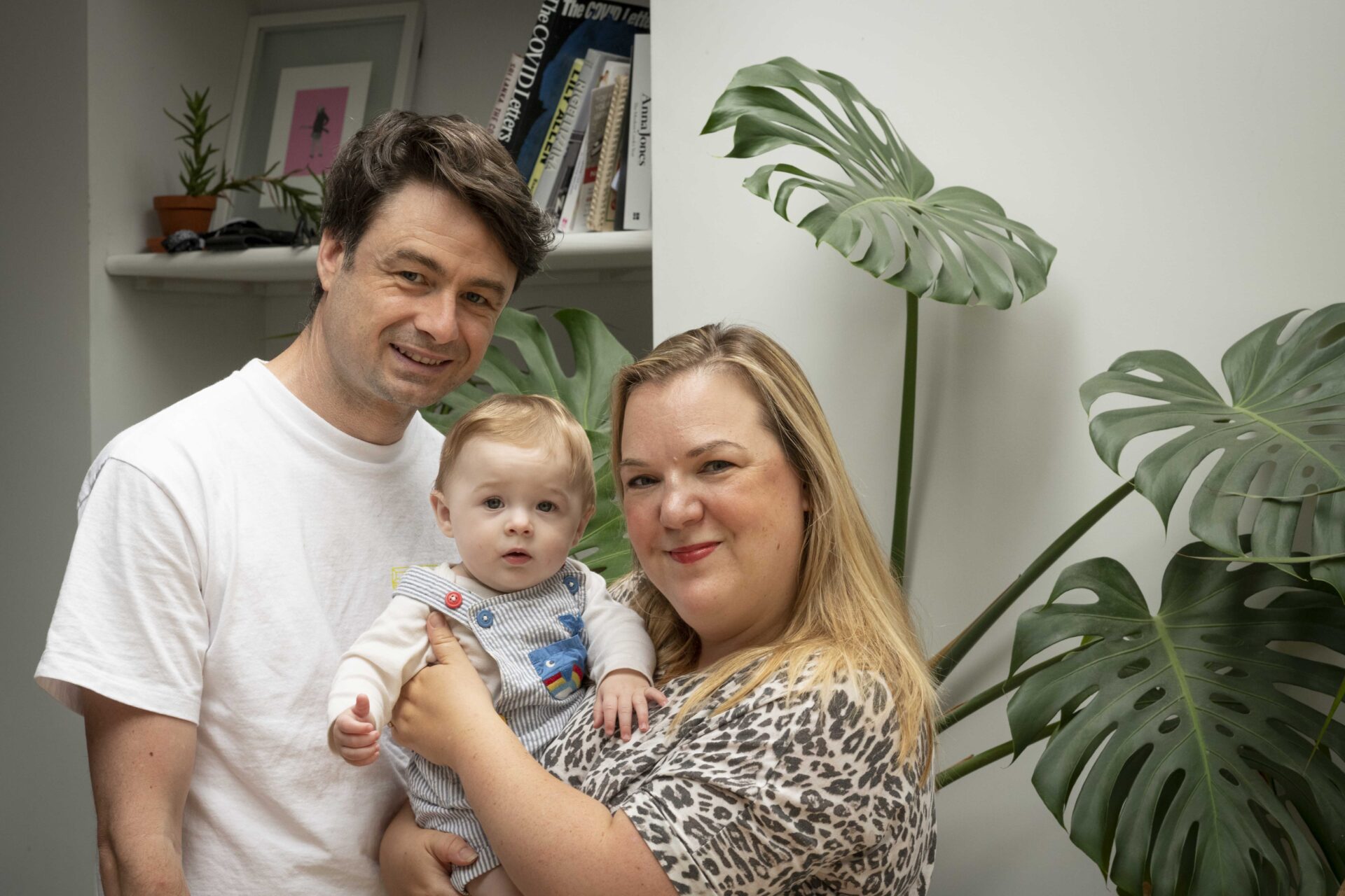 Children playing at home during a family photoshoot