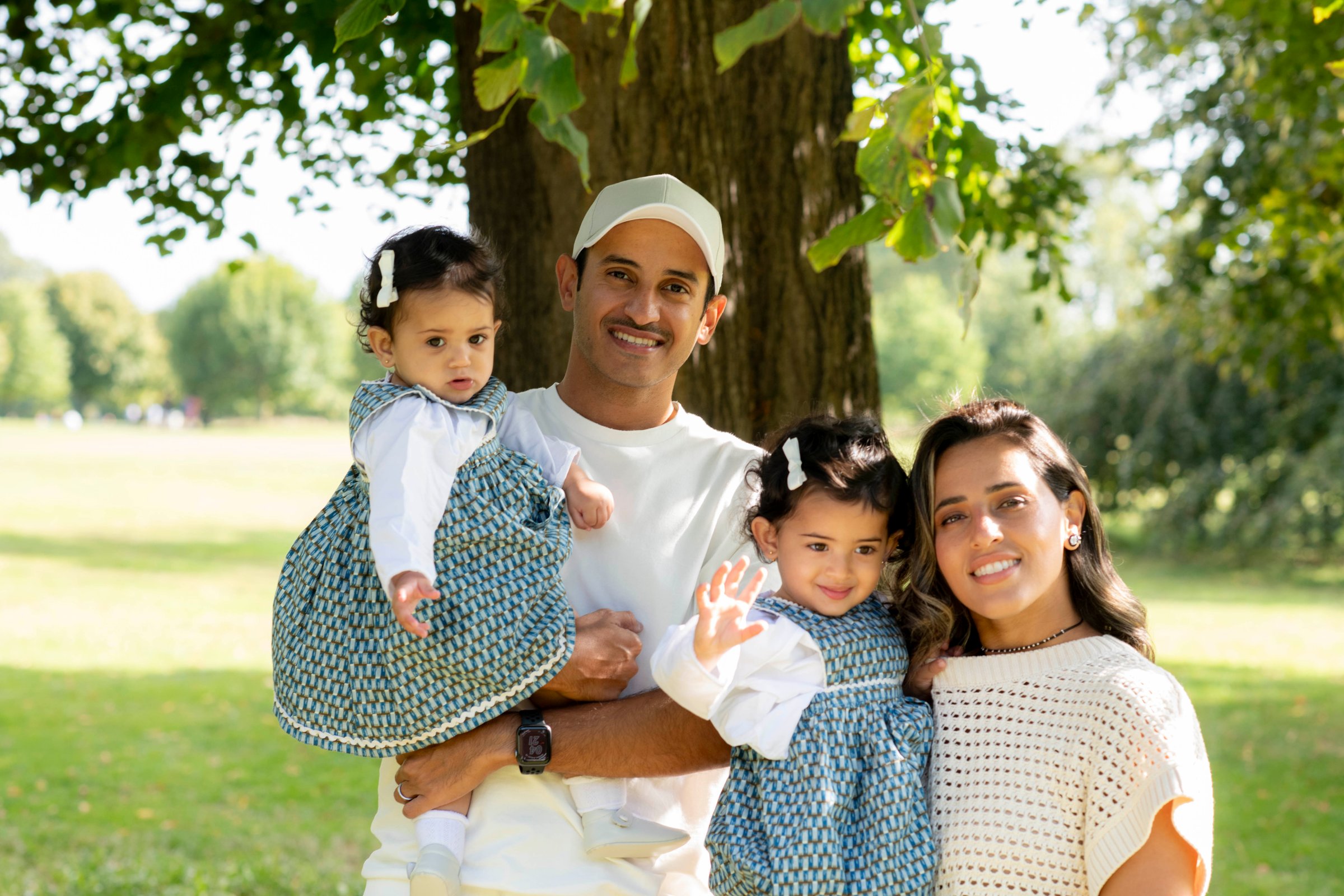 Children running in a park on a family shoot